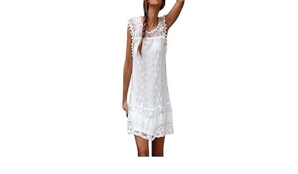 white dress with tassels on bottom