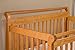 DaVinci Emily 4-in-1 Convertible Crib in Honey Oak