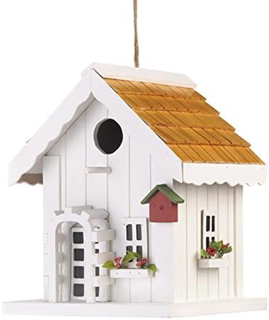 White-washed wood creates the cozy and charming Birdhouse of its own