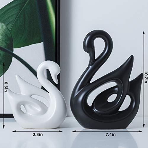White ceramic swan statue priced at $27.49.