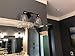 Phansthy Black Wall Sconce Double Sconce Light with Dual 5.6 Inches Clear Glass Lampshade(Black)