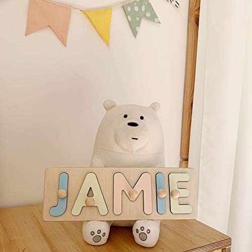 wooden name puzzle with pegs