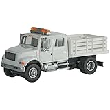 INTERNATIONAL(R) 4900 CREW-CAB OPEN STAKE-BED UTILITY TRUCK - ASSEMBLED -- WHITE WITH UTILITY COMPANY DECALS