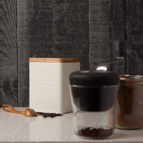 Introducing the Now Designs L170001aa Square Coffee Tin - a must-have for coffee connoisseurs seeking a blend of style and functionality. Crafted from premium food-grade steel, this container guarantees the longevity of your cherished coffee beans or grounds.

Measuring 4.5 inches in length, 4.5 inches in width, and 5.75 inches in height, this tin features a secure, tightly-fitting lid that safeguards the enticing aroma and flavorful essence of your coffee. Its exterior showcases a captivating vintage-inspired coffee print, elevating your kitchen countertop or coffee bar with its elegant charm.