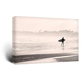 Canvas Wall Art Sports Theme - Man Walking Down The Beach a Surfing Board Under His Arms - Giclee Print Gallery Wrap Modern Home Art Ready to Hang - 12x18 inches