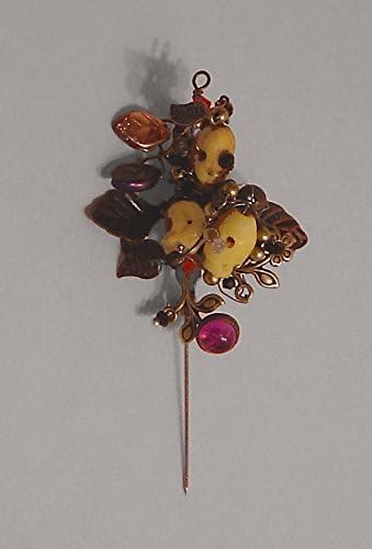 Bone skulls, amethyst cabochon, brass leaves swarovski crystals brooch pin