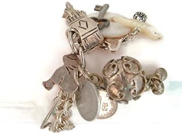 Charm bracelet vintage sterling forks recycled one of a kind vintage coins baubles and dangles