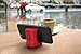 Genuine Fred 5216342 REBOOT Silicone Rain Boots Mobile Phone Stand, Red