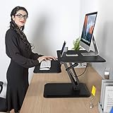 SLYPNOS Height Adjustable Standing Desk Converter Sit to Stand up Desk Riser, with Keyboard Mouse Deck and Cup Holder, 25 Inches Wide Ergonomic Workstation