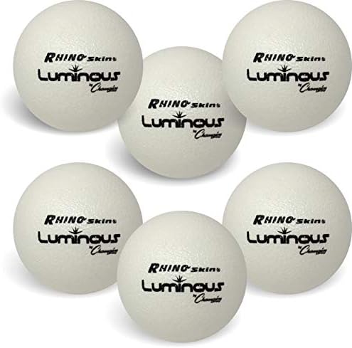 Colorful dodgeballs stacked in a playground.