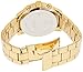 GUESS Classic Gold-Tone Stainless Steel Bracelet Watch with Day, Date + 24 Hour Military/Int'l Time. Color: Gold-Tone (Model: U0330L1)