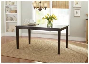 Dining Table. The wooden table set for 6 is great for your dining room. Counter height and great for kitchen and patio. The table is mocha color, solid, and can be used with table top cloth. This furniture is a great addition to your home. Guaranteed