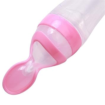 baby rice in milk bottle