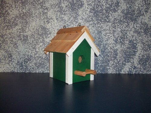 Rustic Cedar Roof Primitive Birdhouse. This Primitive Birdhouse Is a Great Match for Your Country Home and Garden Landscape Design. Your Feathered Friends and the Bird Lovers in Your Life Will Be Delighted with It. It's an Amish Country Collectible. Measures 9 3/4" H X 6 1/4" W X 6 1/4" D.