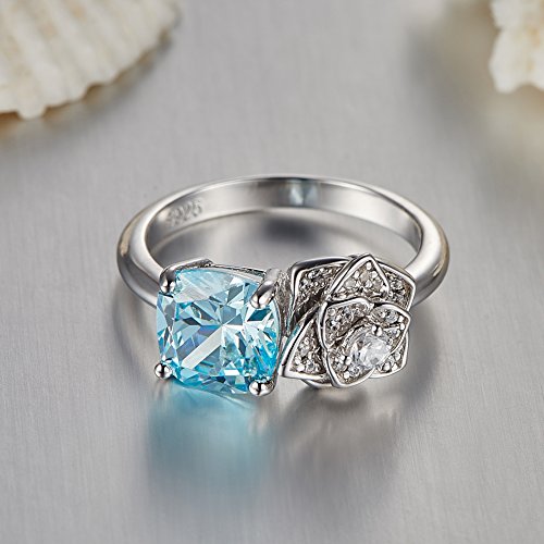 Merthus Womens 925 Sterling Silver Created CZ Infinity Band Wedding Br Merthus Womens 925 Sterling Silver Created Blue Topaz Flower