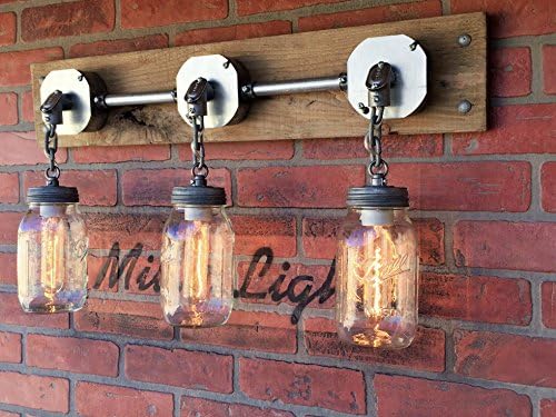 THE JARS OF LIGHT - A triple Mason jar wall sconce chandelier light with exposed conduit on reclaimed wood | MillerLights Original.