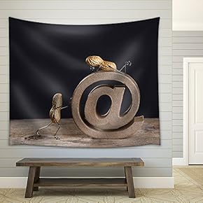 Peanut People Pushing a Large at Sign as a Symbol for The Internet and Email - Fabric Wall Tapestry Home Decor - 51x60 inches