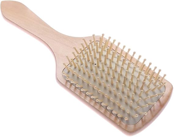 brosse en bois cheveux bouclés
