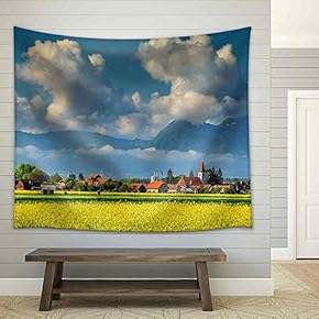Spectacular Village with Canola Field and Cloudy Mountains in Background Near Brasov,Transylvania,Romania,Europe - Fabric Wall Tapestry Home Decor - 51x60 inches