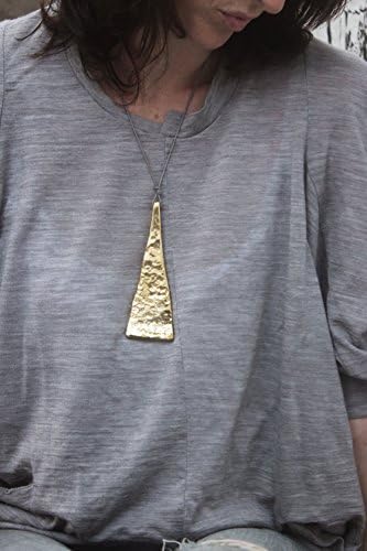 Modernist Jewelry! Our "Quarry Tribal Pendent" in solid golden Brass gets you thinking! Makes a great gift too. FREE Shipping worldwide!