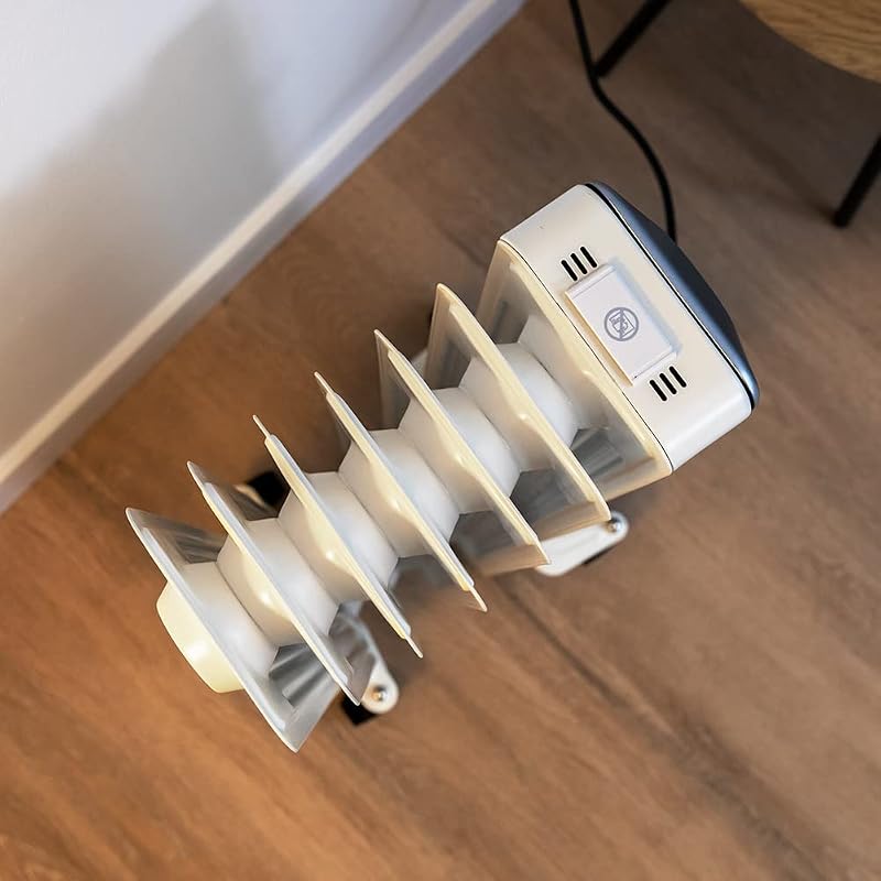Radiatore elettrico ad olio ReadyWarm 7000 Space. 7 moduli, basso consumo energetico, 1500 W, 3 Livelli, Raccoglitore di Cavi, Sistema di Sicurezza, Ruote, 15 m2