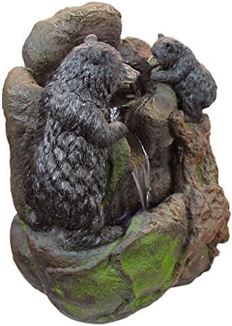 Water fountain with LED lights for backyard patio, featuring double doors design.