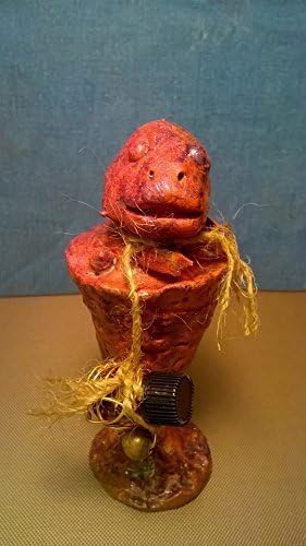 Ralph. Sea Monster Charm. A unique, one of a kind, hand sculptured gift. I'm a fish perched up on a rock. I have a bottle of Tea Tree Oil hanging by my side to give as a gift to my one true love.