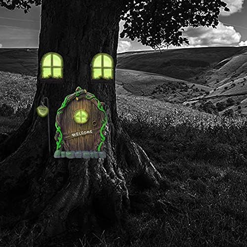 Fairy door nestled in a tree trunk in a fairy garden setting, glowing warmly.
