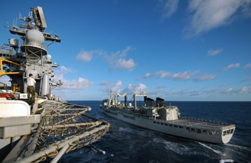 The Royal Australian Navy auxiliary oiler replenishment ship HMAS Success (AOR 304) conducts a reple