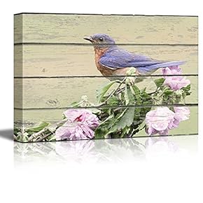 Blue Bird Sitting on a Flower Branch on...