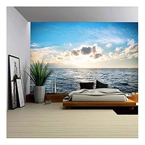 BRAND_NAMEwith Blue Water Sky and Clouds Sunset Above Seascape