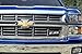(1) Black Z-71 Front Badge Emblem w/ Grille Mount Insert Bracket For Chevrolet Avalanche Silverado Colorado Tahoe Suburban, etc