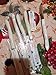 CUTCO Model 1759 Table Knife with White (Pearl) handle....................3.4” High Carbon Stainless DD serrated blade.............in factory sealed plastic bag.