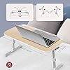 TaoTronics Laptop Table,Foldable Laptop Desk for Bed , Height and Angle Adjustable Lap Bed Desk,Portable Bed Tray Table…