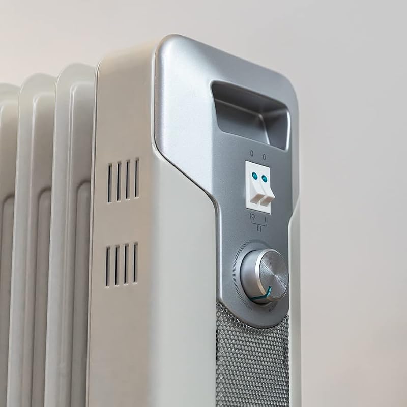 Radiatore elettrico ad olio ReadyWarm 7000 Space. 7 moduli, basso consumo energetico, 1500 W, 3 Livelli, Raccoglitore di Cavi, Sistema di Sicurezza, Ruote, 15 m2