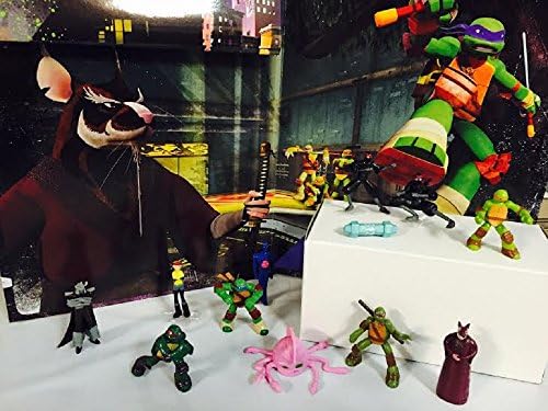 Nickelodeon Teenage Mutant Ninja Turtles 12 Piece Birthday Cupcake Topper Set Featuring 2" Cupcake Toppers of Sensei Splinter, Donatello, Leonardo, Raphael, Michelangelo, April, Shredder, Kraang
