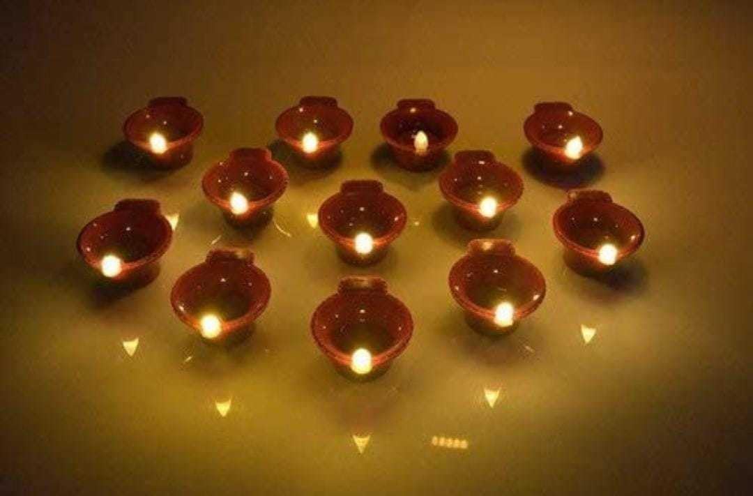 Oil Lamps & Accessories - Meera's Era Water Sensor Electric Diya for Diwali Home Decoration, Gifting Purpose, Fancy Design (Water LED Diya Pack of 6_P40)