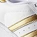 adidas Originals Superstars Running Shoe, White/Gold/Blue, 3 Medium US Little Kid