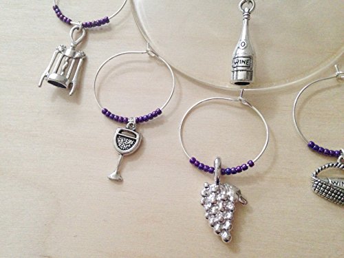 Vineyard themed Wine Charms. Includes Bottle, corkscrew, grapes, wine glasses with Cheers, picnic basket. Set of 6. PURPLE BEADS.