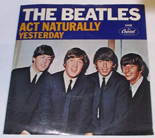 Amazon.com: i feel fine / she's a woman 45 rpm single: CDs & Vinyl