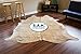 BUTTER CREAM AND WHITE COWHIDE RUG