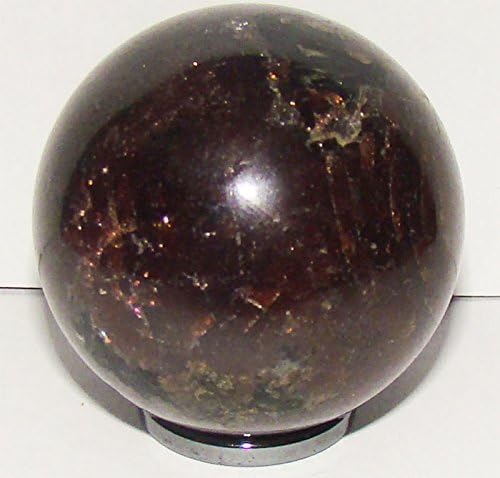 Dark chatoyant garnet sphere from Russia