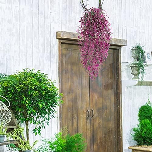 Hanging synthetic vines in plastic containers for decor.