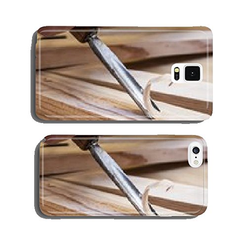 Gouge wood chisel carpenter tool working wooden background cell p…