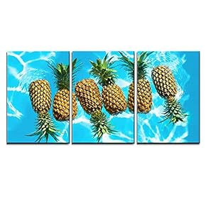 Healthy Raw Organic Food Fresh Ripe Pineapples Floating...