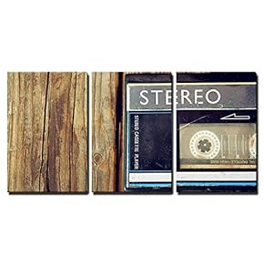 Old Portable Cassette Player on a Wooden Background x3 Panels