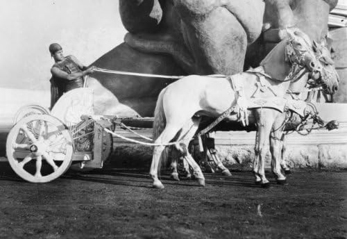 Photographs - 1926 photo Ramon Novarro in chariot, in front of movie set. Ramon Novarro as d9