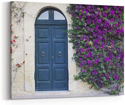 Rosenberry Rooms Canvas Wall Art Prints - A Mediterranean House in Gozo, Malta with an Old Door and A Tree with Flowers Climbing The Wall (48 x 32 inches)