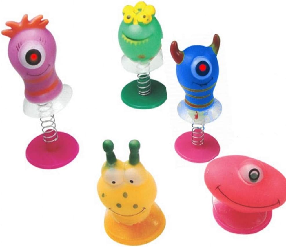 Amazon Com 6 Assorted Jump Pop Up Monster Toys Childrens Kids Party Bag Fillers Boys By Childrens Party Accessories Home Kitchen