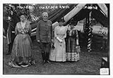Photo: Mrs. C.F. Roe,General J.F. Bell & wife,Mrs. J.M. Lawton,dresses,Bain News,tent